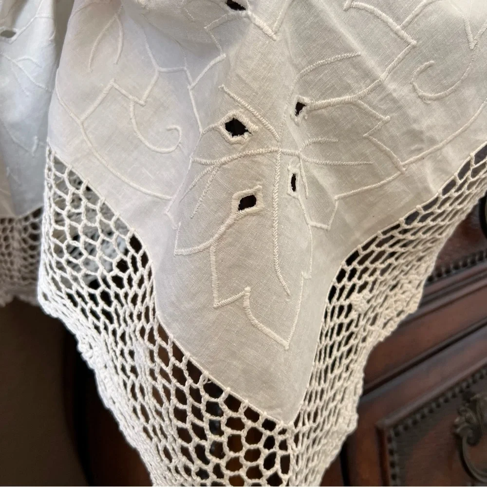 Vintage Cream Square Tablecloth with embroidered detailing, made of linen .
